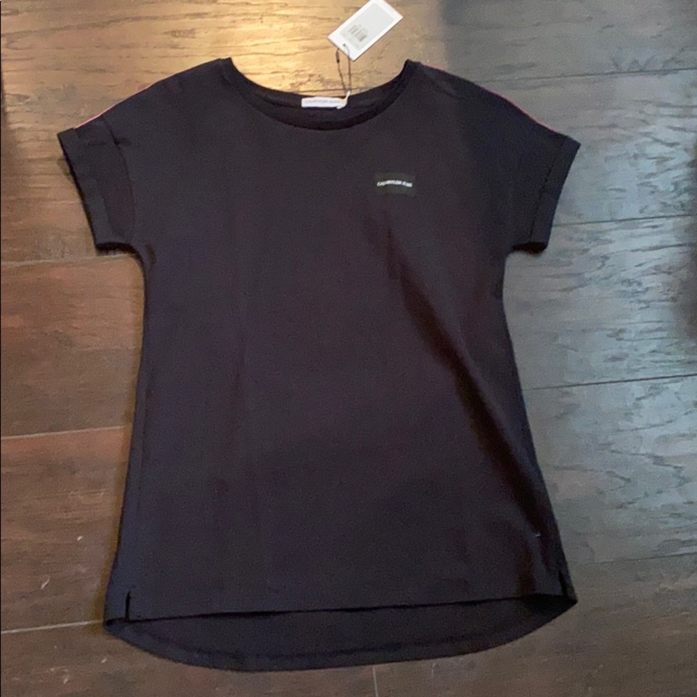 Black Calvin Klein shirt. A little pink NEVER WORN
